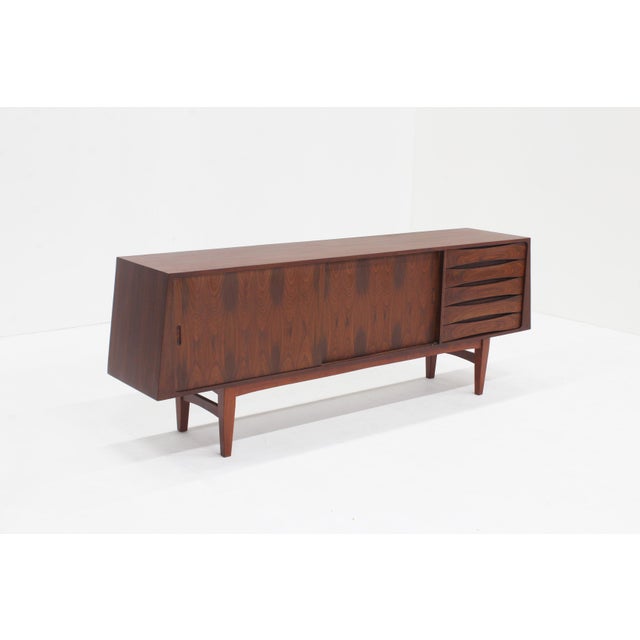 Vintage mid century Danish sideboard Vintage Mid Century sideboard made of teak wood from Denmark. This beautiful...