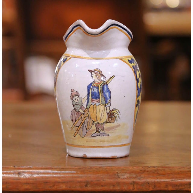 Late 19th Century Pair of 19th Century French Quimper Faience Jugs With Breton Figures and Floral For Sale - Image 5 of 13