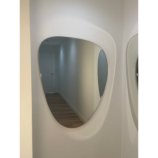 Measurements are taken at the widest/tallest points due to the unique shape. This is a set, so the two mirrors pictures...