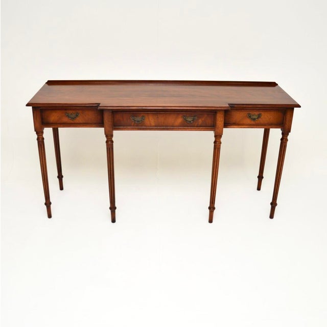 A smart and very well made antique Georgian style console table. This was made in England, it dates from around the...