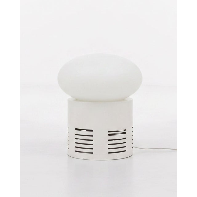 Large floor lamp with white plywood base and plastic shade. The lamp has an E27 fitting and emits beautiful light....
