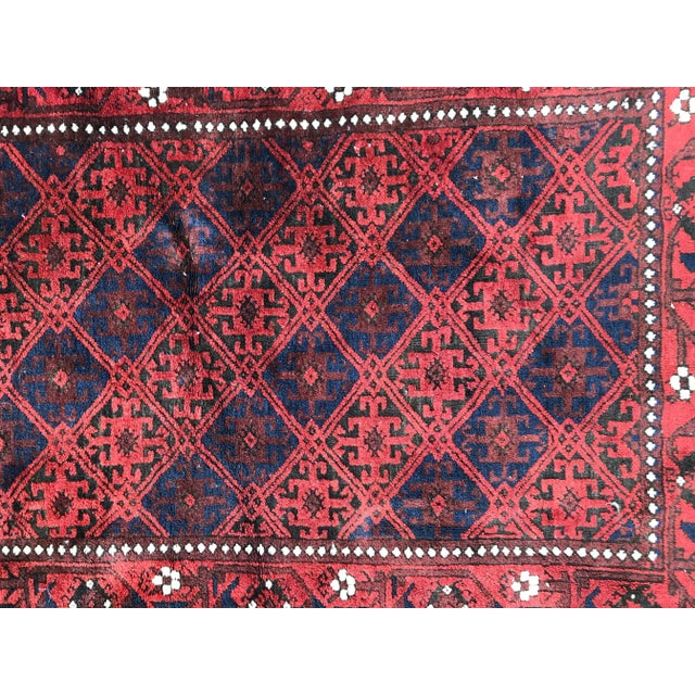 Beautiful Late 19th Century Turkmen Baluch rug, with a nice tribal design and natural colors, entirely hand knotted with...