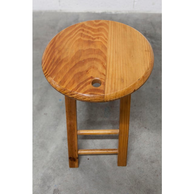 Low folding stool by Roger Tallon. Made in the 1960s from solid pine. Stable and clean stool. Diameter 31cm Height 45.5cm...
