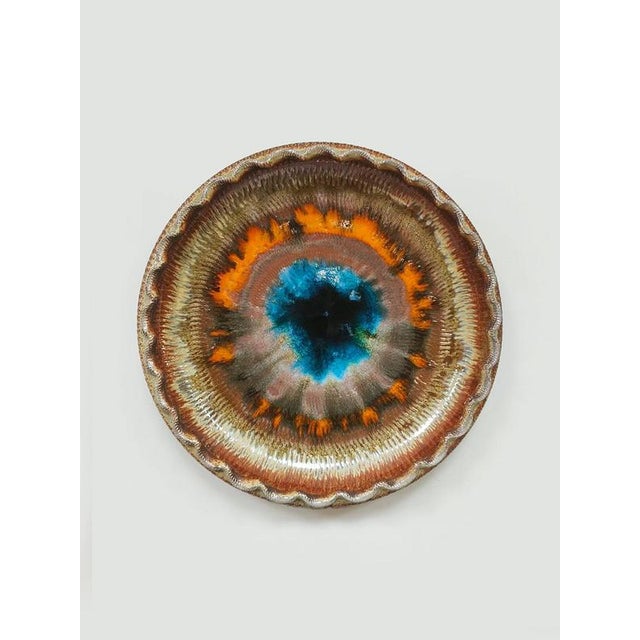 This vintage ceramic wall bowl is beautiful in any room! The organic shape with a wavy rim gives the piece a playful and...