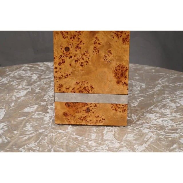 Refined and particular table lamp by Tommaso Barbi, clean in its style, the table lamp is full of precious and distinctive...