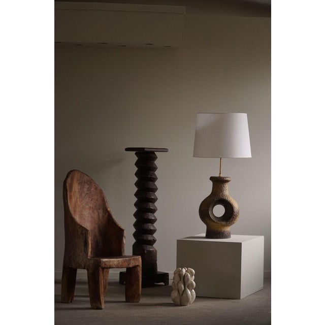 A fine and decorative large handmade danish mid-century modern stoneware table lamp. Various green / brown colors. Unknown...