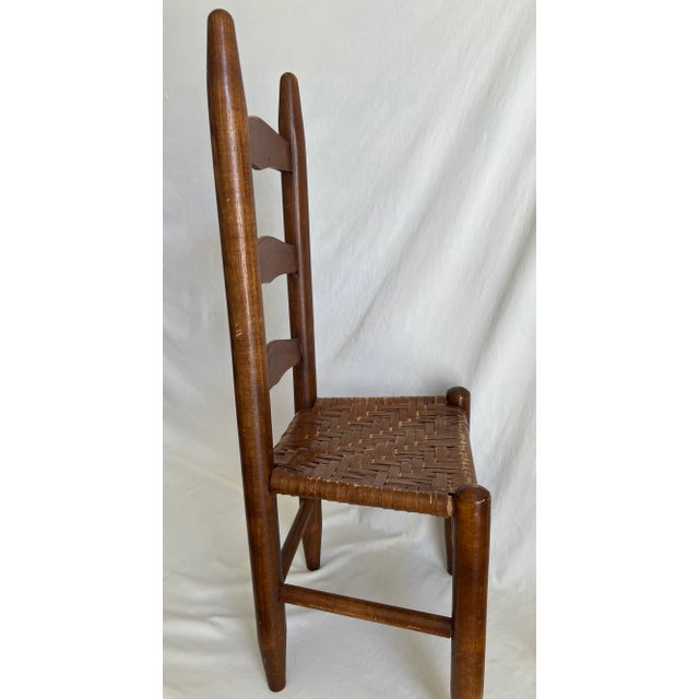 This is a traditional ladder-back chair for a child. Originally the majority of seats were constructed using cane or rush....