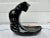 This Royal Haeger Black Cat figural stand is glazed in a black glaze and finished in a high gloss. This piece is unmarked,...