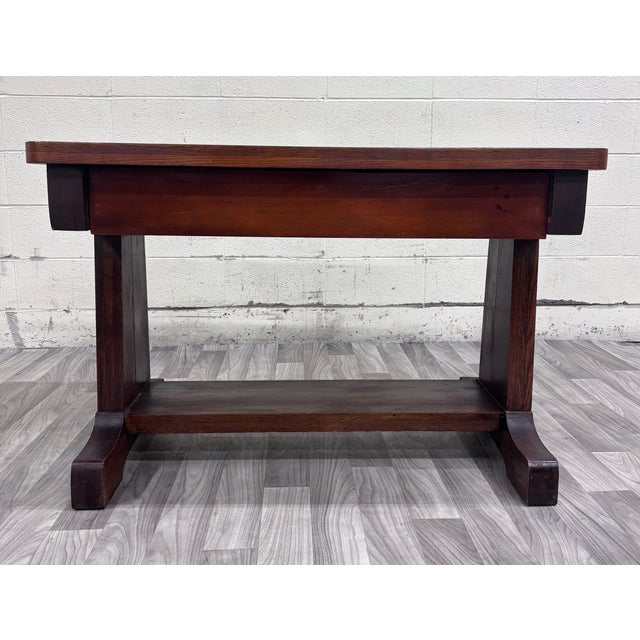 This is a stunning antique Mission oak library table, console, or hall table dating to the early 1900s. Features a richly...