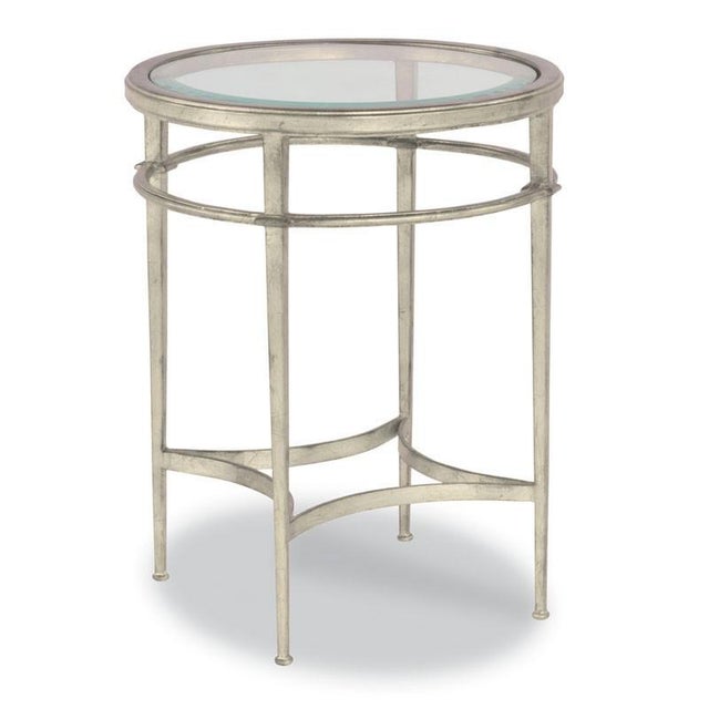 A lovely table inspired by 19th Century French originals with a round ½” beveled glass top that is fitted inside a top...