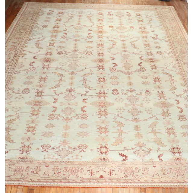 An early 20th-century oversized Turkish Oushak Rug with an all-over design on a light blue field Details rug no. j2715...