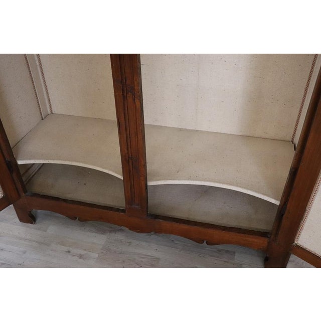 Rare and important antique wardrobe in solid poplar wood made in early 18th century of the period baroque. Internally...