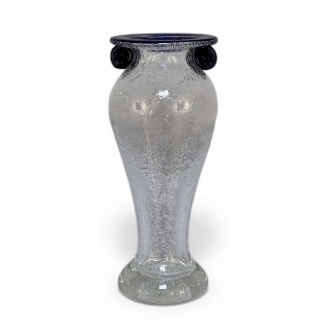 Mid-Century Hand-Blown Glass Flower Vase was created by the master glass crafters of Venice, Italy, and features an...