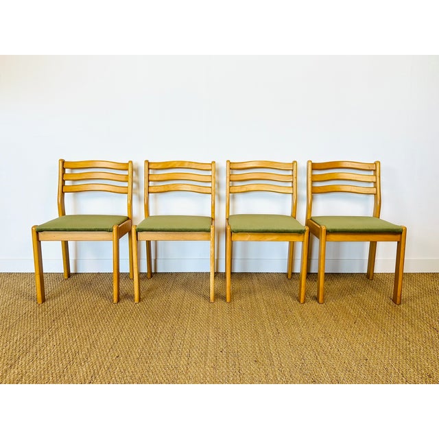 Set of four vintage scandinavian chairs in light wood, with a simple and functional design. their solid beechwood frame...