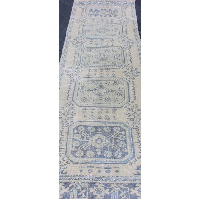 Vintage Turkish Oushak Runner in Faded Blue in Neutral Background For Sale In Atlanta - Image 6 of 13