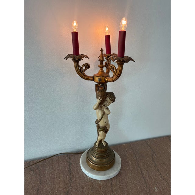 Neoclassical Antique Neoclassical Figural Candelabra Table Lamp, Featuring a Cherub or Putti Figurine Holding a Candelabra, on a Marble Base For Sale - Image 3 of 12
