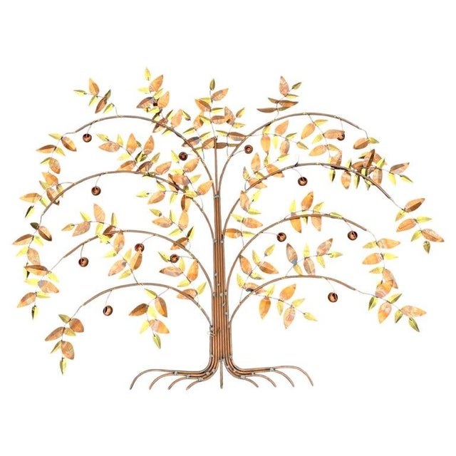 Large Mid Century Mixed Metal Tree Wall Sculpture by Curtis Jere. Entitled "Tree of Life" this green and gilt gold tree is...