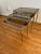1970s Brass and Smoked Glass Set of 3 Vintage Nesting Tables Attributed to Maison Jansen For Sale - Image 5 of 6