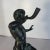 Great Maitland Smith Bronze Figure of a Male Playing what Appears to be a Horn, Bugle, or Trumpet, while standing on a...