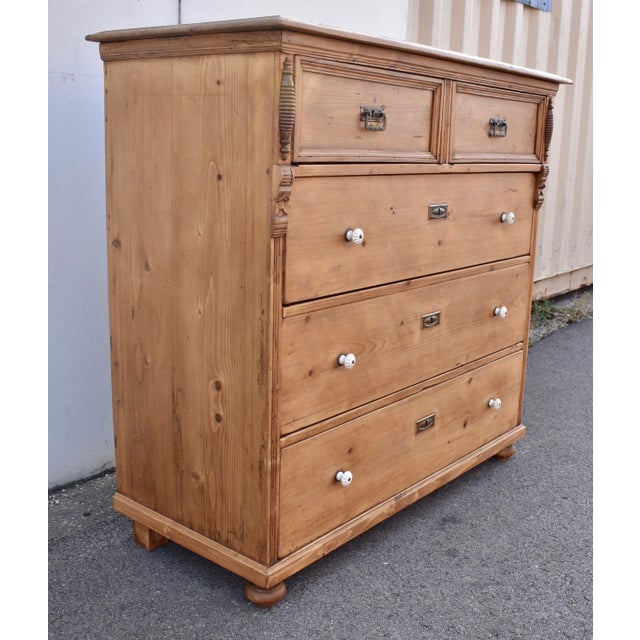 This large “two over three” chest of five drawers has a step-down routed edge to the top with an ogee molding beneath,...