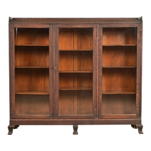 R. J. Horner Style Victorian Carved Oak Glass Front Triple Bookcase, Circa 1890s