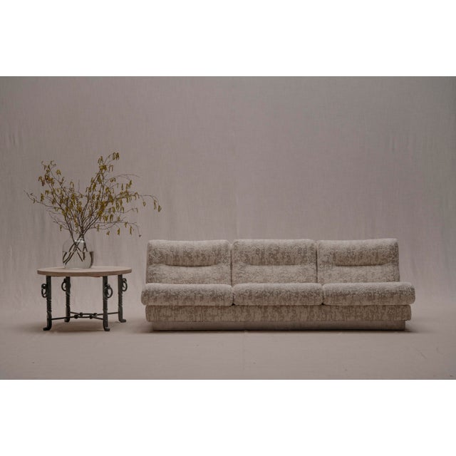 A striking “California” three-seater sofa designed by Jacques Charpentier in France during the 1970s. This model is a...