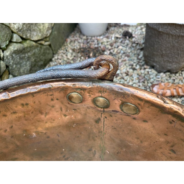 Huge Copper Pot with Iron handle which was discovered in an old New England home. The size is 25" across and 17" Tall....