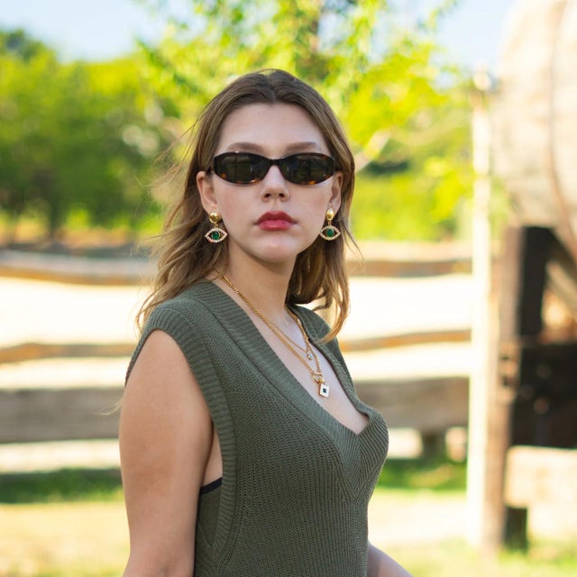 Balance your spirit with the Emerald Harmony Eye Earrings. Highlighting a deep green cat eye stone surrounded by dazzling...