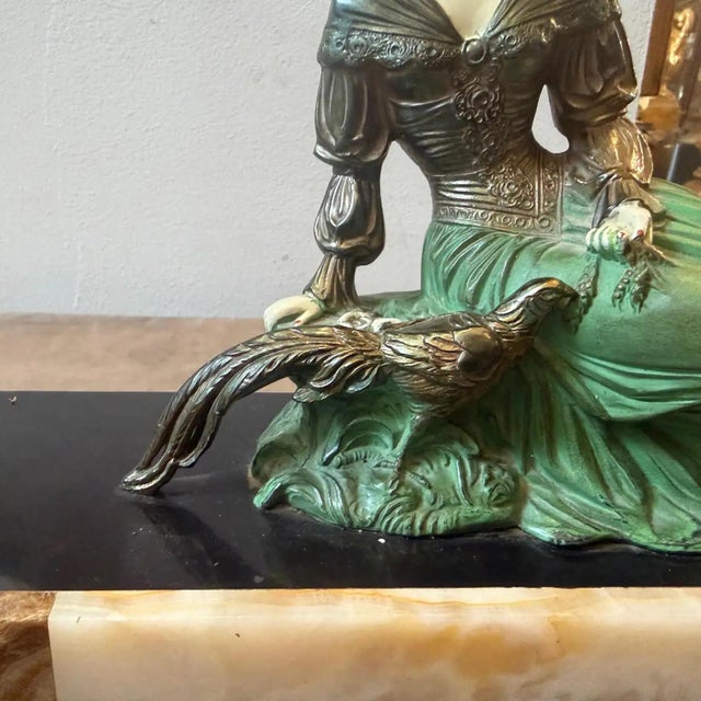 This exquisite French Art Deco statue from the 1930s perfectly captures the glamor and theatricality of the era. Crafted...