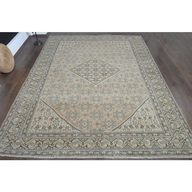 Vintage Persian Hand-Knotted area rug is a semi-antique vintage area rug. The '70s Eastern region of Anatolian's unique...