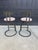 Elevate your kitchen or entertaining space with this stylish pair of contemporary modern industrial swivel counter stools....