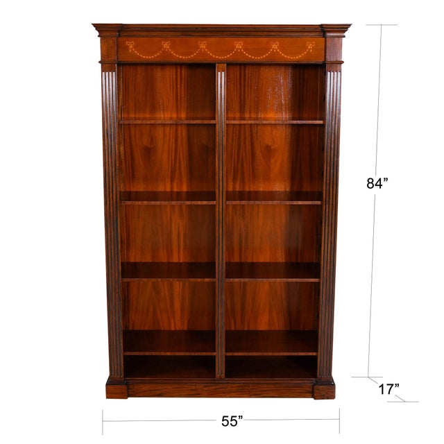 An excellent quality Large Mahogany Bookcase produced by Niagara Furniture. The top section features a moulded cornice...