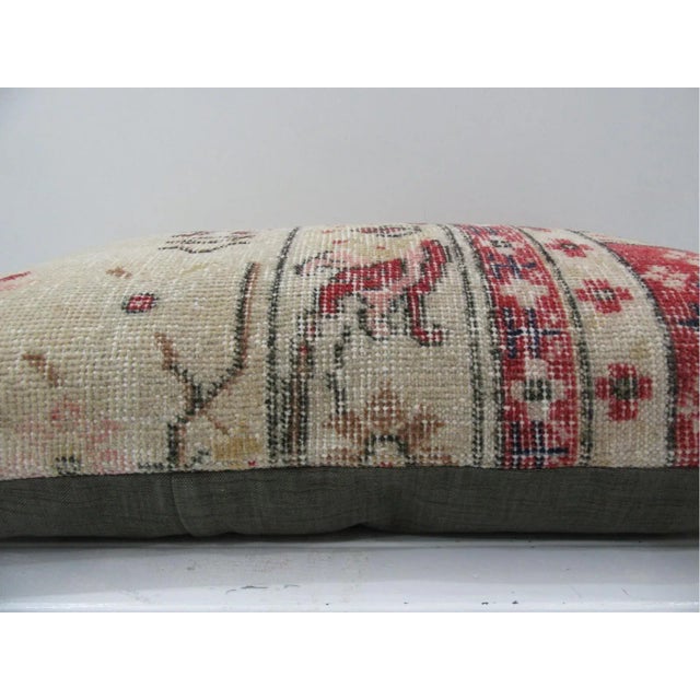 This is a pillow cover made from a vintage kilim rug. The piece was properly washed and ready to use. Pillow inserts not...