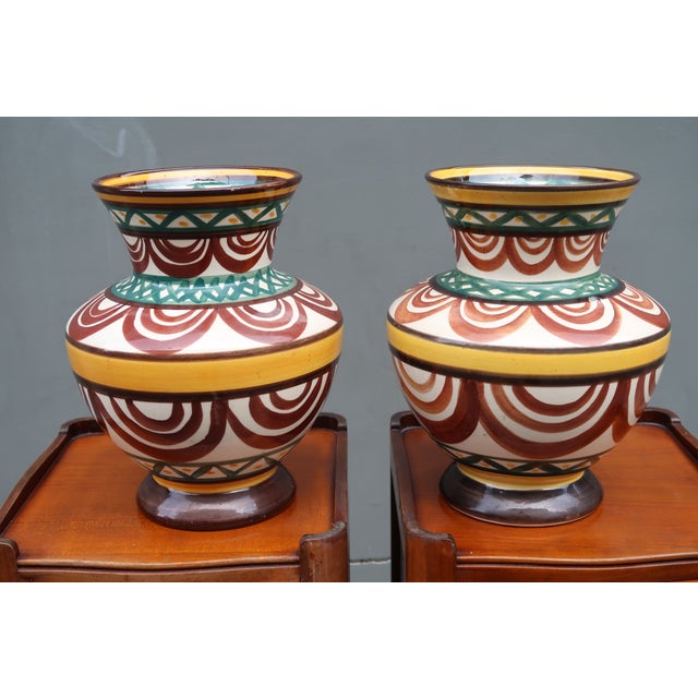 Pair of french vintage vases signed Saint Jean de Bretagne Majolica work around 1950. Height 10.2" / Diameter 7.9" They...
