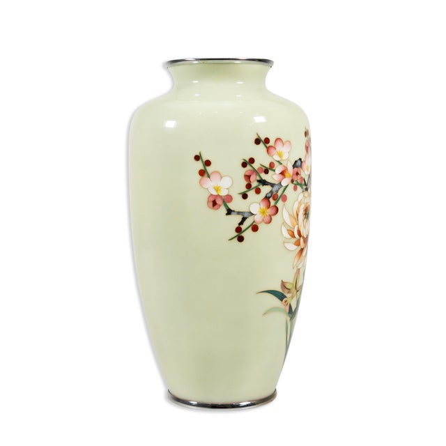 A Vintage Japanese Cloisonné Vase with Chrysanthemums by The Ardo Jubei Company. This exquisite vase is marked on the...