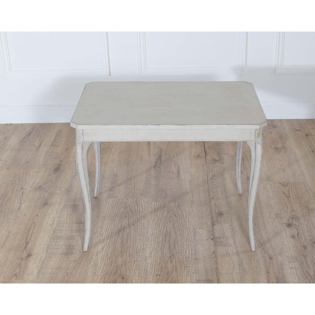 Charming Swedish coffee table from the early 20th century, showcasing the refined simplicity and balance of Scandinavian...