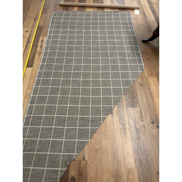 Designer's Guild's "Branette" modern check fabric. Creating a loose check this chunky herringbone weave creates a look...