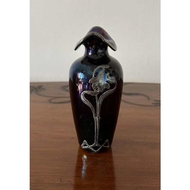 Art Nouveau glass vase with sterling silver overlay decoration. The vase is a classic example of Art Nouveau,...