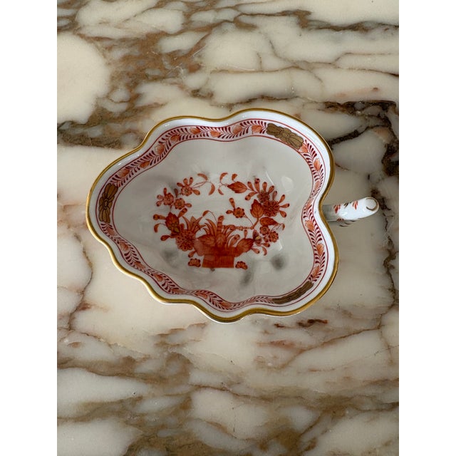 Beautiful Herend dish in Chinese Bouquet pattern with handle. All handpainted and adorned with 24 karat gold trim. Bottom...