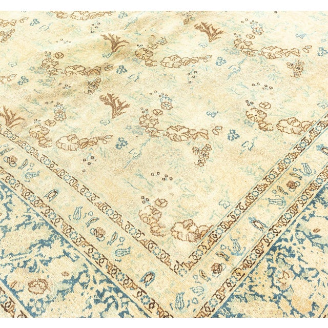 one of the more finely-knotted of the DLB gallerys late 19th century Persian antique tabriz rugs, the abrashed caramel...