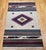 Bring authentic Southwestern charm into your space with this vintage Saltillo kilim rug, beautifully handwoven in the...