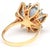 This vintage synthetic spinel ring evokes a sensuous mood. A crown of yellow gold holds the faceted light blue stone and...