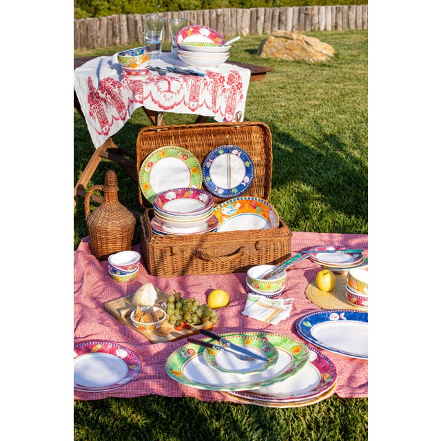 The Melamine Campagna Gallina Oval Platter features plucky, handpainted roosters on a soft green background, and its...