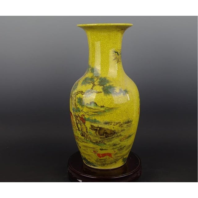 H-43cm,W-23cm. This Chinese Ceramic Vase showcases exquisite craftsmanship from the Qing Dynasty with a Qianlong mark. The...