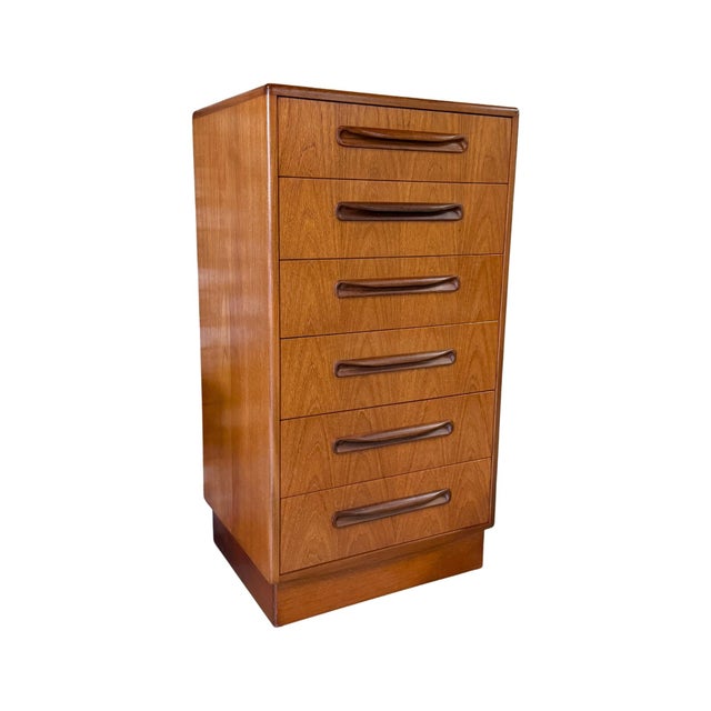 Vintage mid-century modern teak and Afromosia tall chest of drawers designed by V.B. Wilkins for G-Plan’s “Fresco” range...