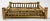 Vintage rectangular footed split reed rattan tray featuring rich burnt tortoise shell finish. Age wear.
