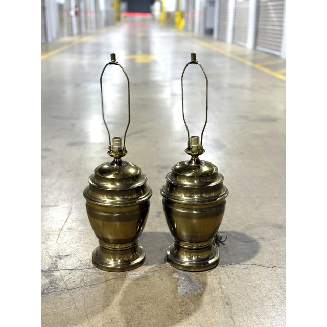 Beautiful pair of brass plated table top lamps. These lamps are in beautiful condition and work perfectly. No shades...