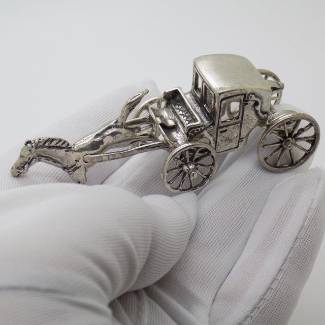 A charming and finely crafted scene, this vintage Italian miniature depicts a classic horse drawn carriage, capturing a...