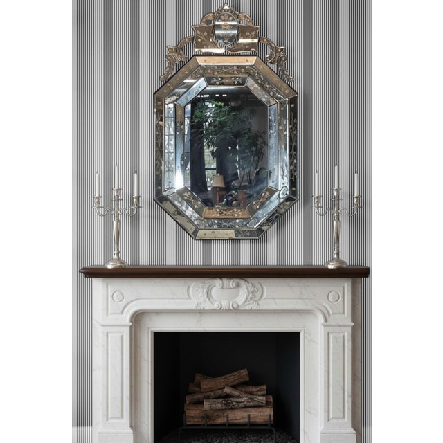Offered for sale is an Octagonal hand-cut and etched-shaped Venetian glass mirror frame with beveled glass glass...