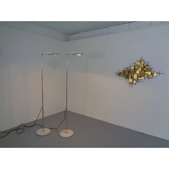 Pair Bruno Gecchelin "Mezzaluna" floor lamps for Skipper Pollux. A dimmer regulates the intensity of the light. Adjustable...